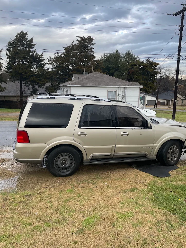 Gold Lincoln Aviator SUV ready for junk car pickup